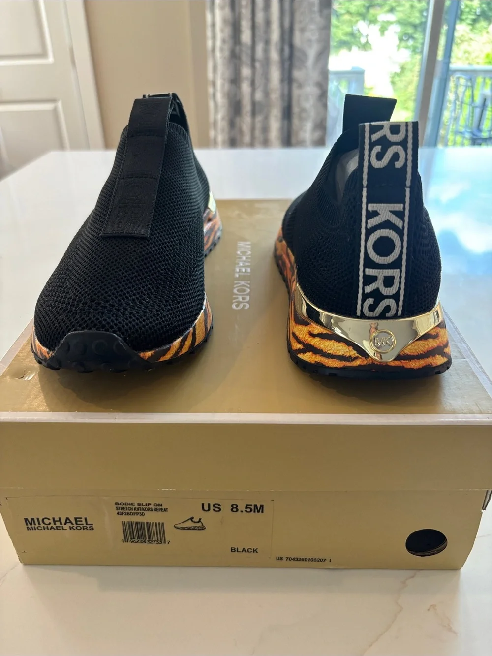Michael Kors Kids Black Knit Slip-On Sneakers with Tiger-Print Accent
